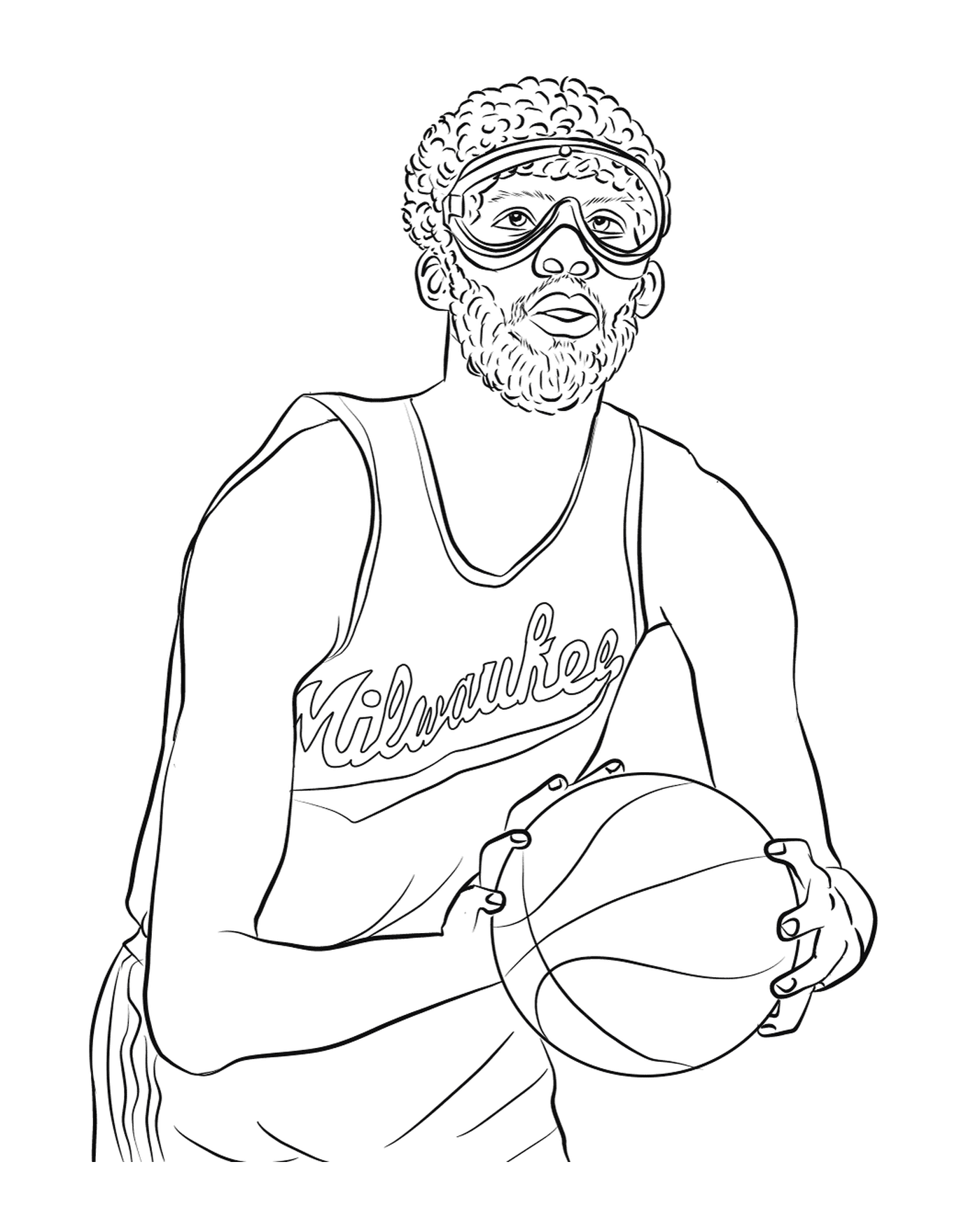  Um homem segurando uma bola de basquete nas mãos 