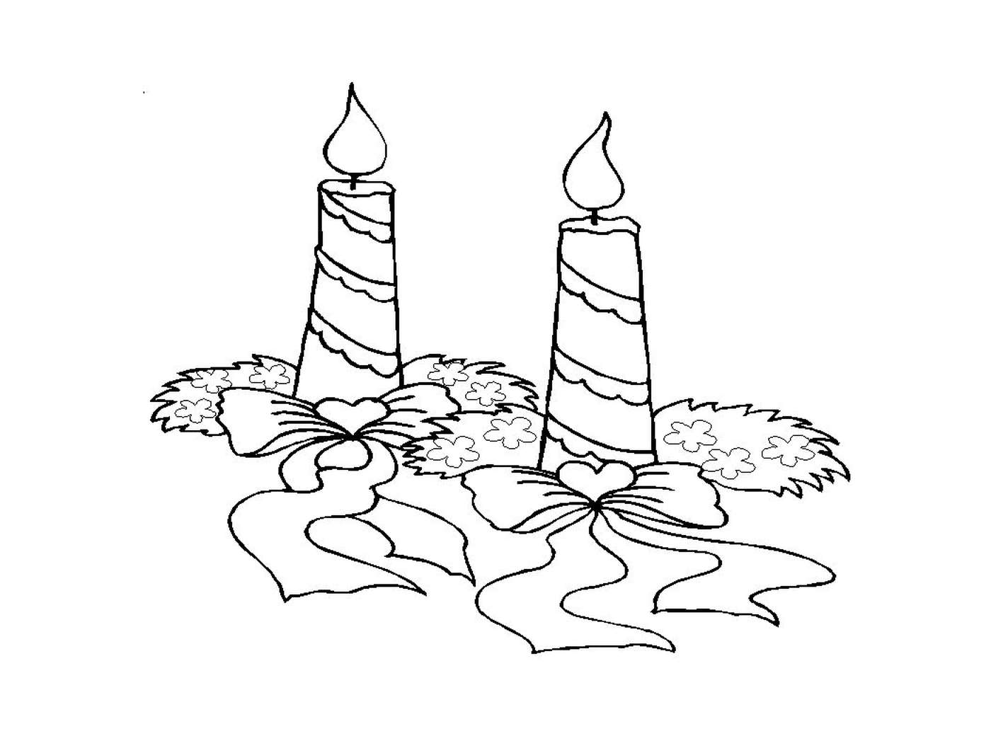  Duas velas acesas colocadas no chão 