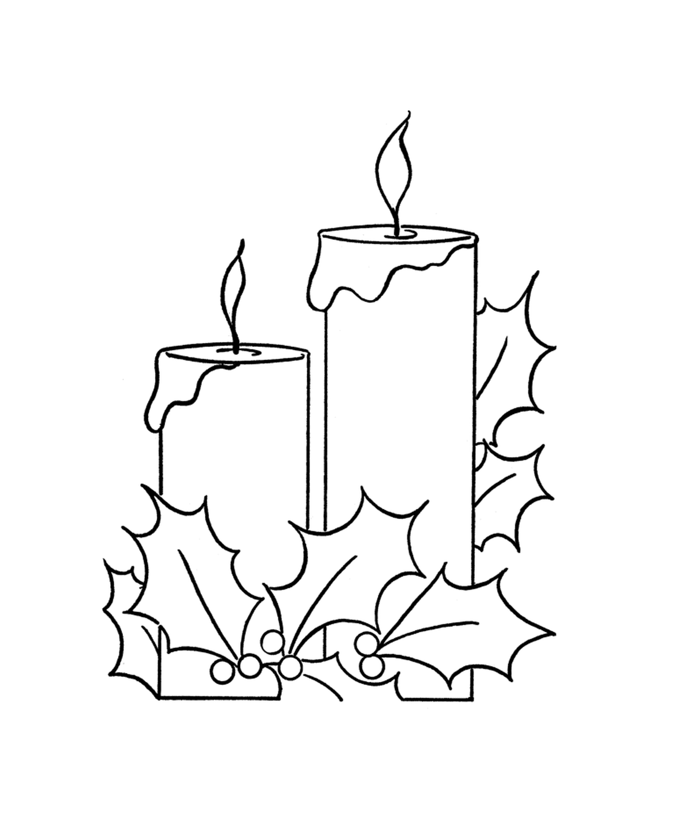  Duas velas acesas com um ramo de azevinho 