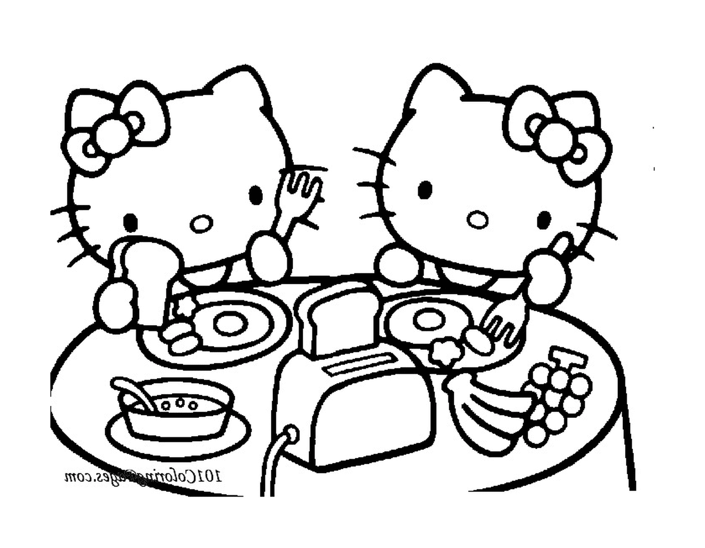  Duas Hello Kittys sentadas em uma mesa de jantar 