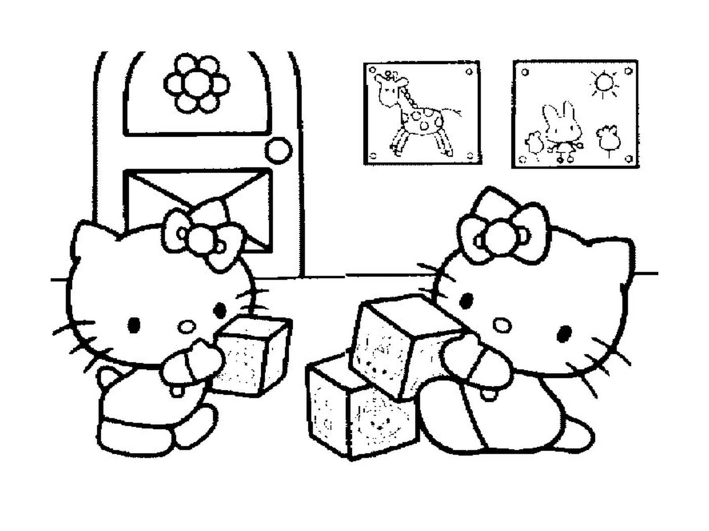  Duas Hello Kittys sentadas em blocos 