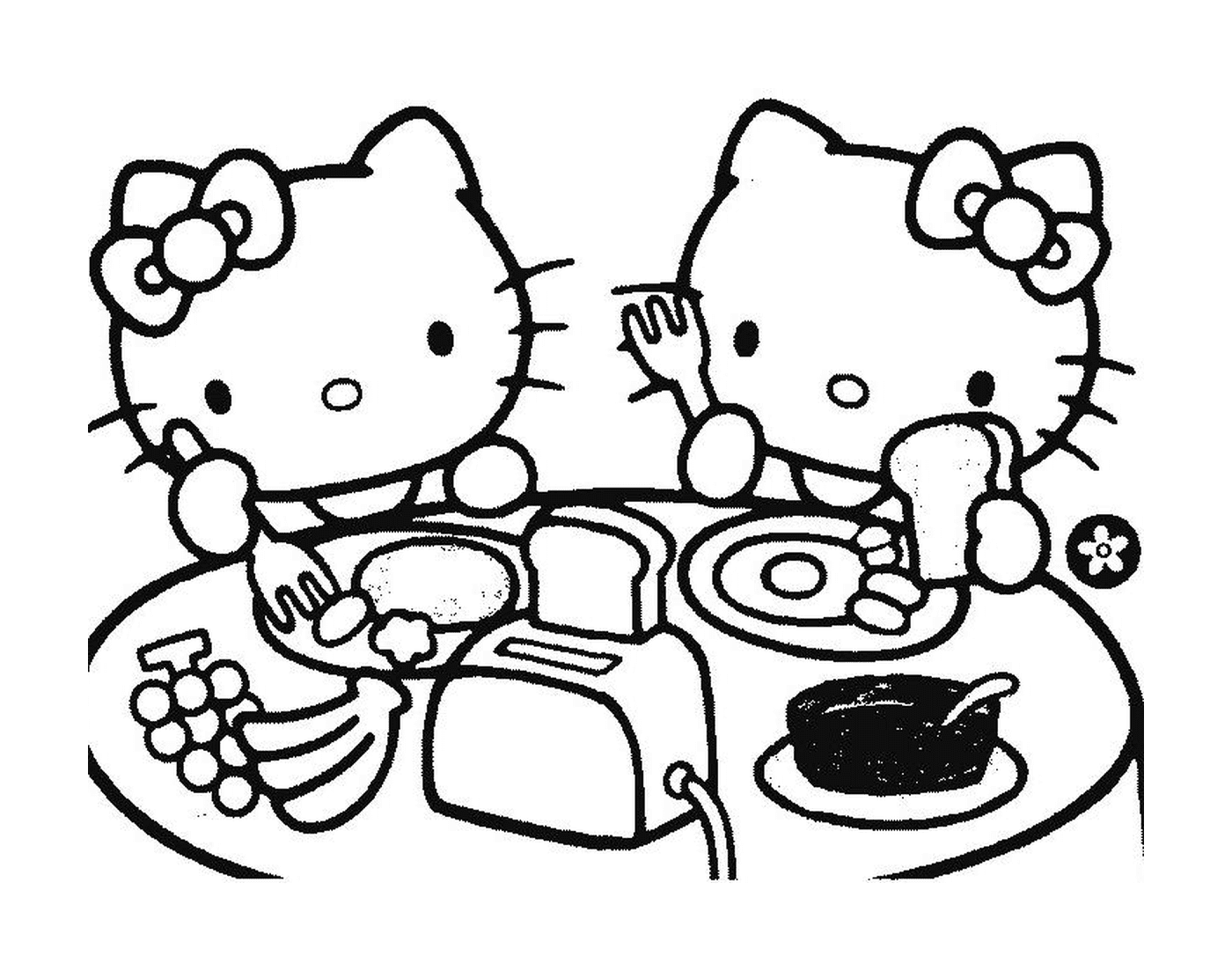 Hello Kitty dois sentado em uma mesa 