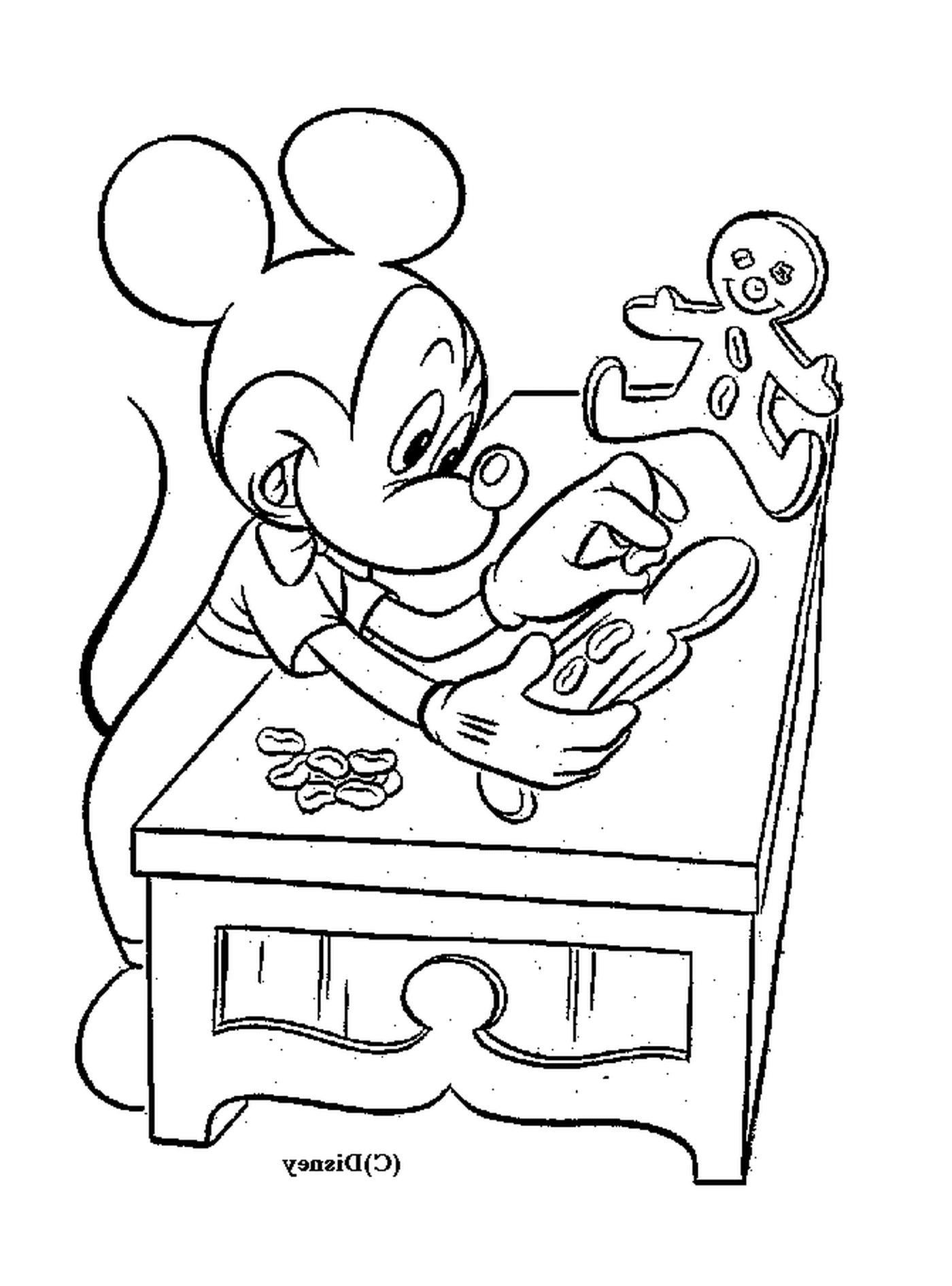  ميكي يصنع الكعك: الجلوس على طاولة مع رجل مصنوع من الزنجبيل 