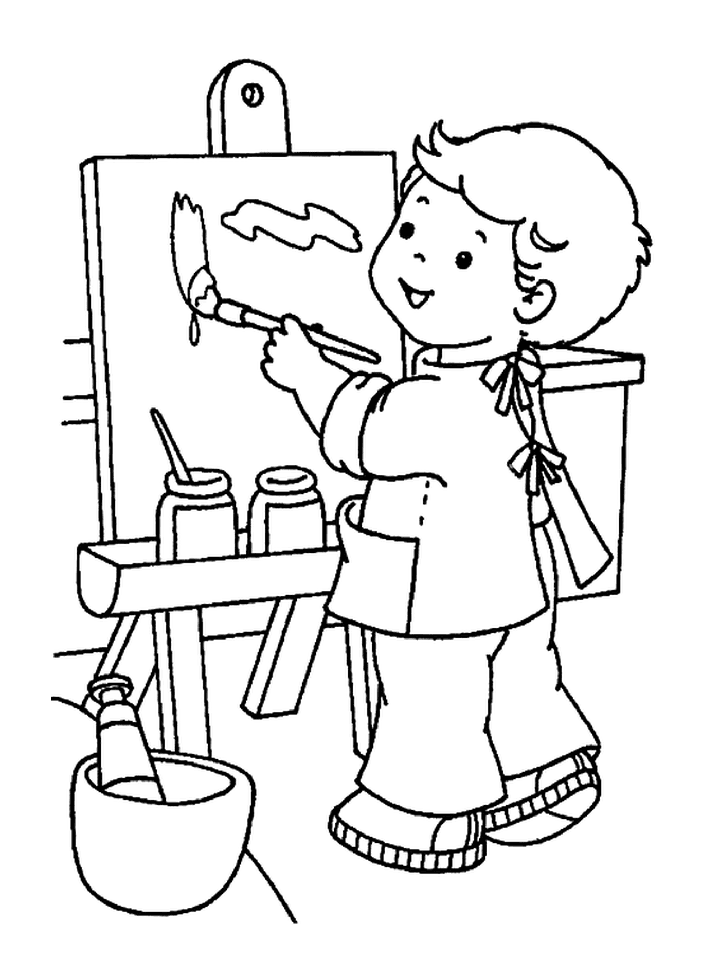  Um menino pintando na escola 