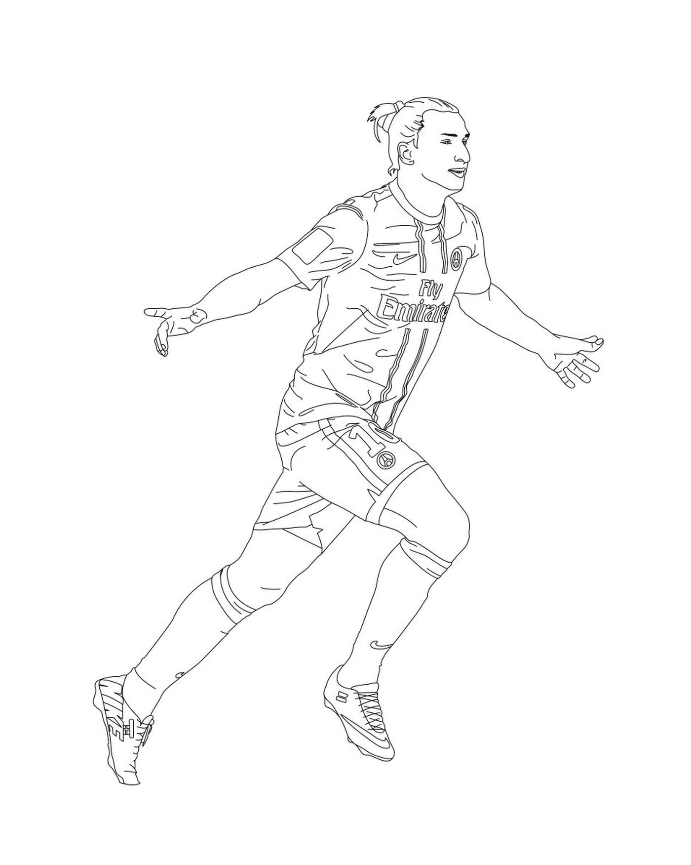  Um jogador de futebol correndo com a bola 