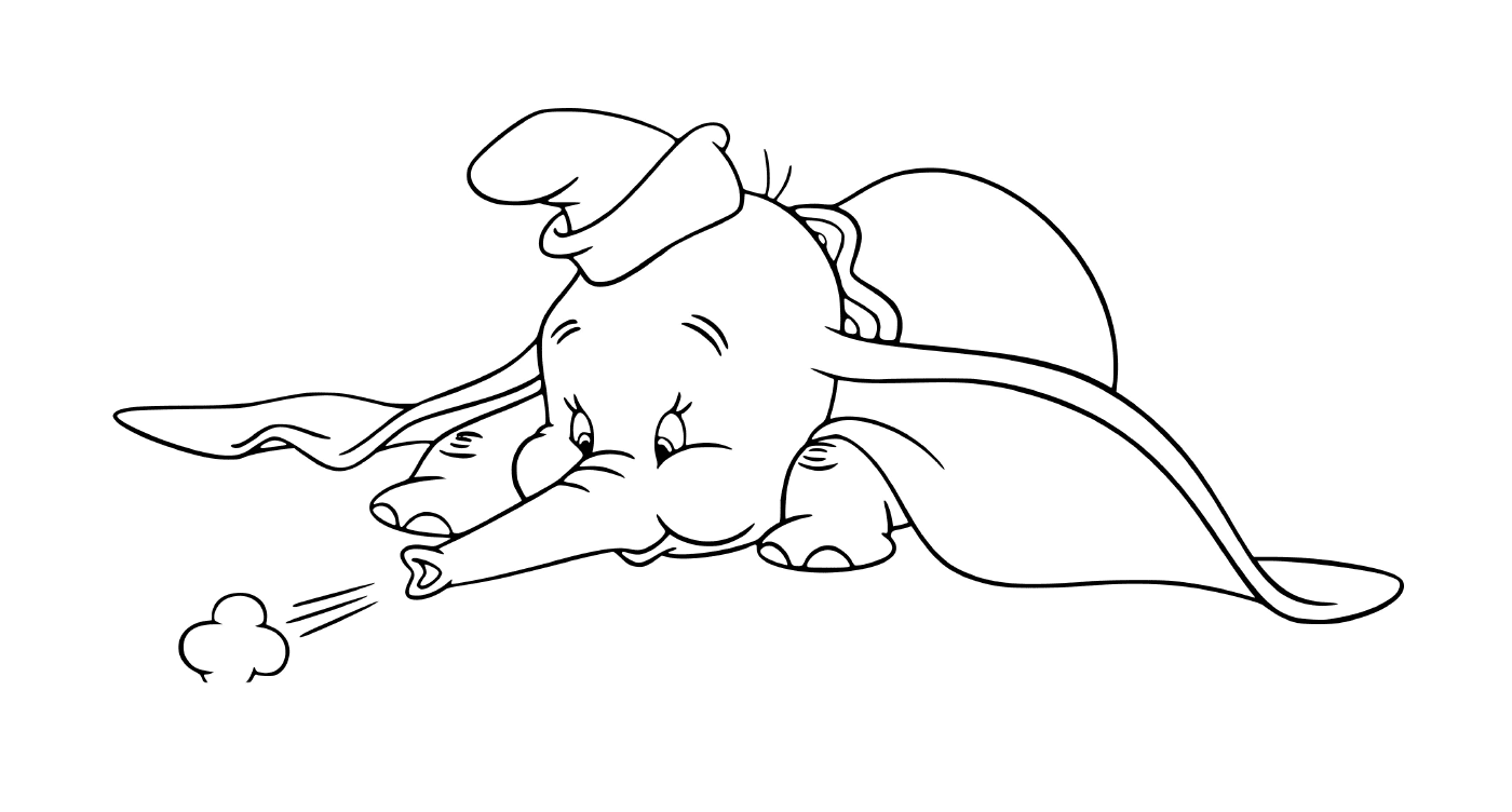 Um elefante com orelhas grandes repousa no chão